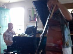 Scot Ranney and Andy Simmons jazz piano and bass duo at a house party