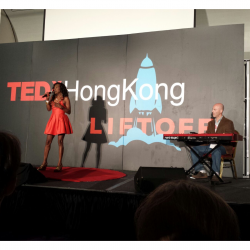 Scot Ranney playing with Sybil Thomas at TedX in Hong Kong